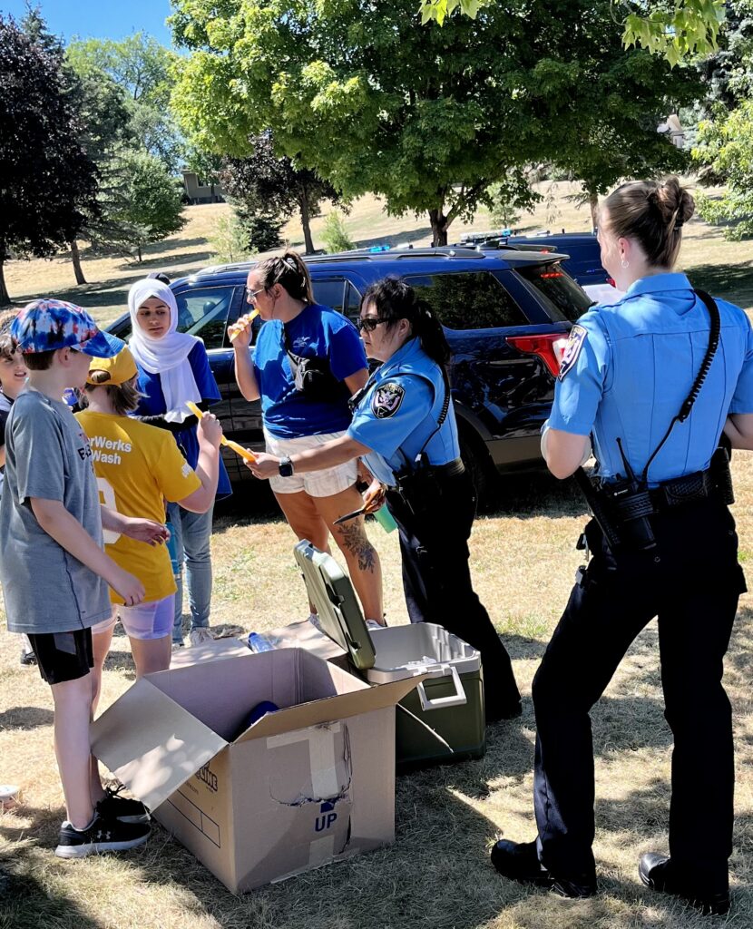officers with kids at event